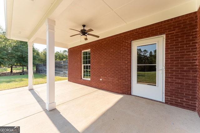 181 Bagley Rd, Eatonton, GA 31024 - view of patio featuring a ceiling fan and fence