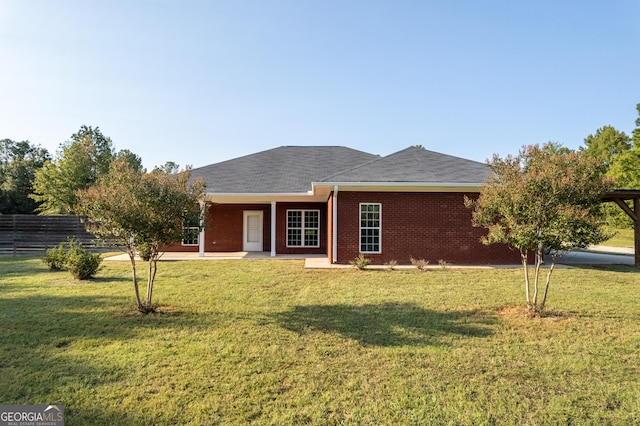 181 Bagley Rd, Eatonton, GA 31024 - view of front of property featuring brick siding and a front yard