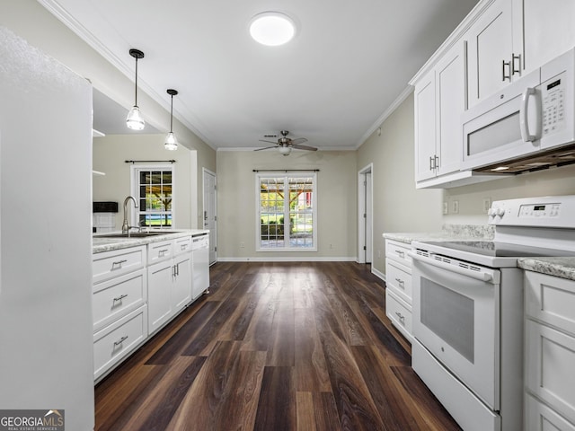 181 Bagley Rd, Eatonton, GA 31024 - kitchen with a sink, white appliances, ceiling fan, ornamental molding, and dark wood-style floors