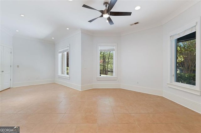 6509 Lily Trl, Fairburn, GA 30213 - spare room featuring plenty of natural light, recessed lighting, light tile patterned floors, crown molding, and ceiling fan