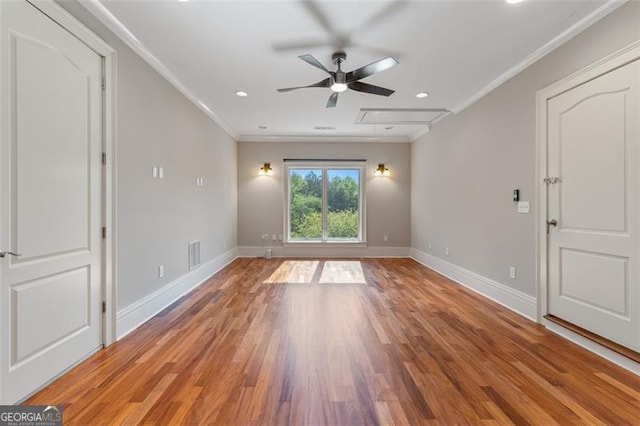 6509 Lily Trl, Fairburn, GA 30213 - empty room with ornamental molding, a ceiling fan, light wood-type flooring, recessed lighting, and attic access