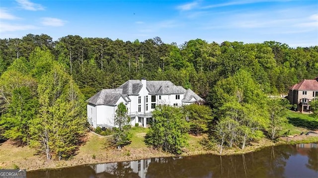 6509 Lily Trl, Fairburn, GA 30213 - view from above of property featuring a nearby body of water and a forest