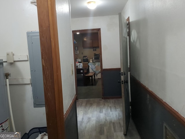 3033 Manchester Dr, Macon, GA 31206 - corridor featuring visible vents, electric panel, and wood finished floors