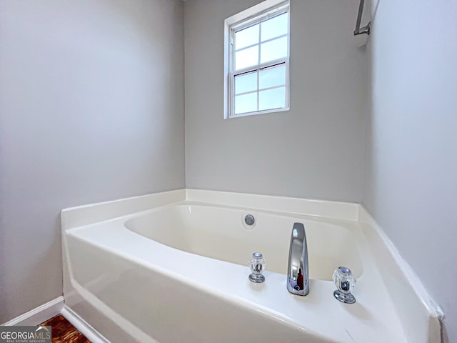 417 Bell Flower Trl, Locust Grove, GA 30248 - full bathroom featuring a garden tub