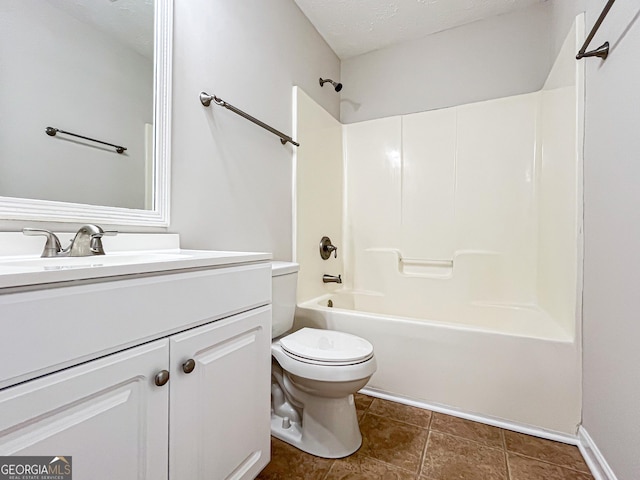 417 Bell Flower Trl, Locust Grove, GA 30248 - bathroom featuring tile patterned flooring, toilet, vanity, and shower / bathing tub combination