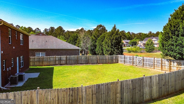 417 Bell Flower Trl, Locust Grove, GA 30248 - view of yard featuring a fenced backyard and central AC unit