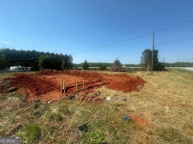 2751 Paoli St, Comer, GA 30629 - entry to storm shelter with a rural view