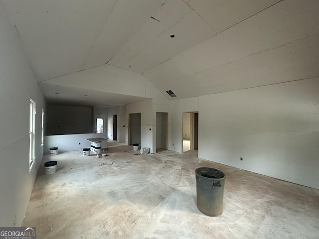 2751 Paoli St, Comer, GA 30629 - unfurnished living room featuring vaulted ceiling