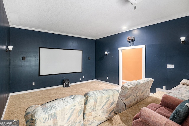 cinema room with carpet floors, ornamental molding, a textured ceiling, and baseboards
