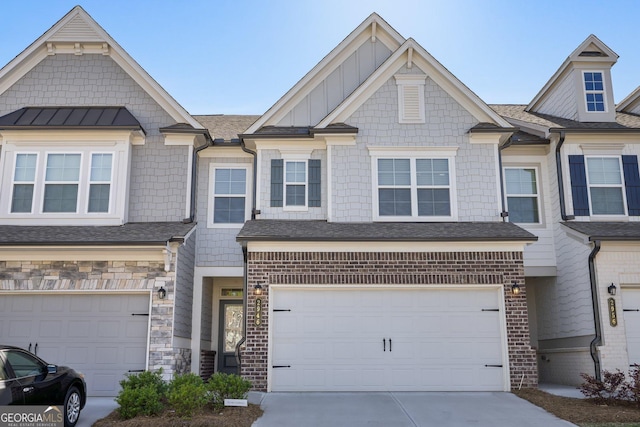 2946 Stockholm Way, Suwanee, GA 30024 - view of property featuring concrete driveway, stone siding, a shingled roof, and a garage