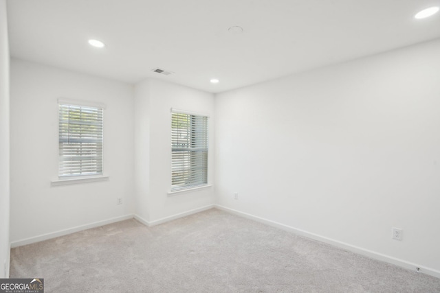 2946 Stockholm Way, Suwanee, GA 30024 - empty room featuring baseboards, visible vents, recessed lighting, and carpet flooring