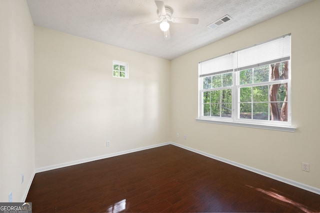 548 W Oaks Dr, Woodstock, GA 30188 - unfurnished room with visible vents, a ceiling fan, and baseboards