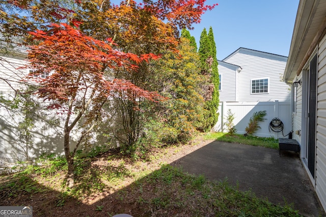 548 W Oaks Dr, Woodstock, GA 30188 - view of yard featuring a patio and fence