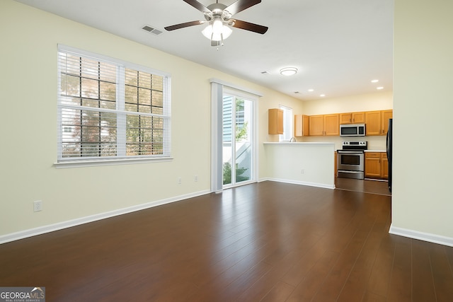 548 W Oaks Dr, Woodstock, GA 30188 - unfurnished living room featuring recessed lighting, visible vents, dark wood-type flooring, baseboards, and ceiling fan