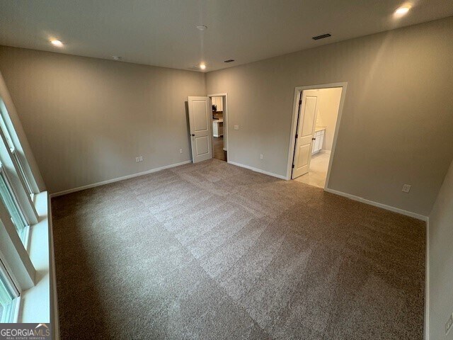 211 Park View Ln, Kingsland, GA 31548 - empty room featuring carpet, baseboards, and recessed lighting