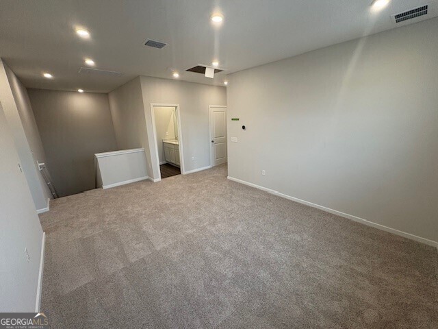 211 Park View Ln, Kingsland, GA 31548 - carpeted empty room with baseboards and recessed lighting