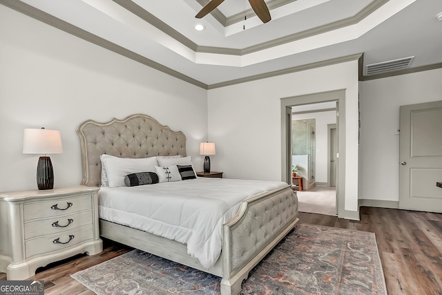 303 Wilsons Creek Bnd, Bonaire, GA 31005 - bedroom with wood finished floors, visible vents, crown molding, and recessed lighting
