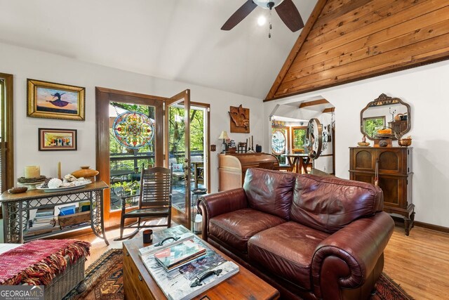 511 Oakdale Rd, Canton, GA 30114 - living area featuring high vaulted ceiling, baseboards, a ceiling fan, and wood finished floors