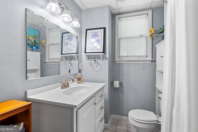 511 Oakdale Rd, Canton, GA 30114 - bathroom featuring vanity, toilet, baseboards, and tile patterned flooring