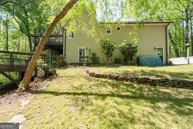 511 Oakdale Rd, Canton, GA 30114 - view of yard featuring central AC and a deck