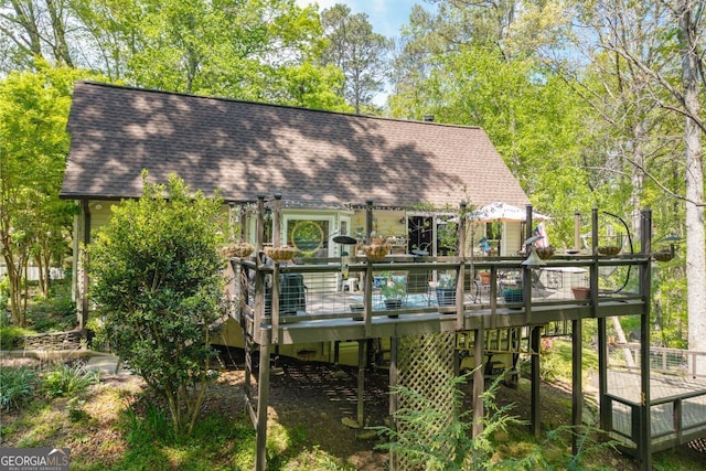 511 Oakdale Rd, Canton, GA 30114 - rear view of house featuring a shingled roof and a deck