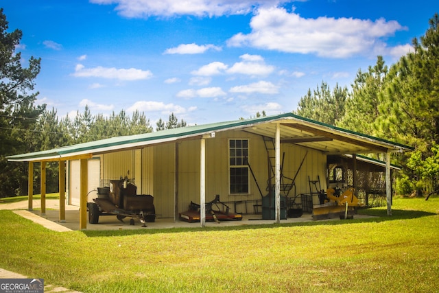 5524 Hooker Branch Rd, Millen, GA 30442 - rear view of property with a lawn, a carport, and a patio