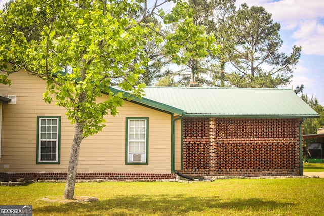 5524 Hooker Branch Rd, Millen, GA 30442 - view of home's exterior featuring a lawn and metal roof