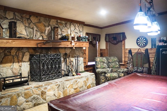 5524 Hooker Branch Rd, Millen, GA 30442 - bedroom with pool table, a stone fireplace, and crown molding