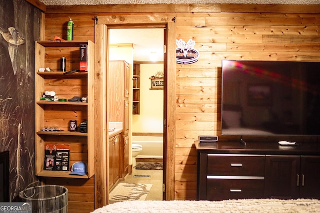 5524 Hooker Branch Rd, Millen, GA 30442 - bedroom featuring wooden walls and ensuite bathroom