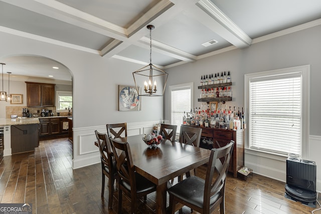 3097 Trinity Grove Dr, Dacula, GA 30019 - dining area with visible vents, dark wood-style floors, beamed ceiling, and arched walkways