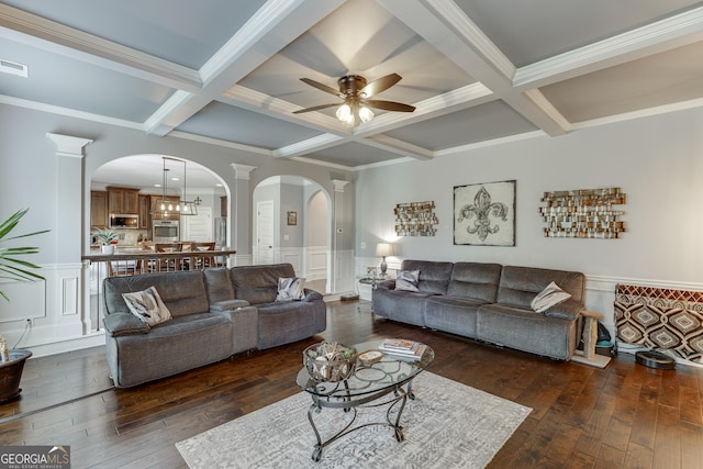 3097 Trinity Grove Dr, Dacula, GA 30019 - living room featuring wood-type flooring, coffered ceiling, arched walkways, and a ceiling fan