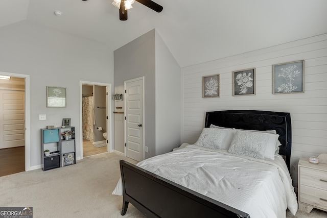 3097 Trinity Grove Dr, Dacula, GA 30019 - bedroom with ensuite bath, light carpet, ceiling fan, baseboards, and high vaulted ceiling