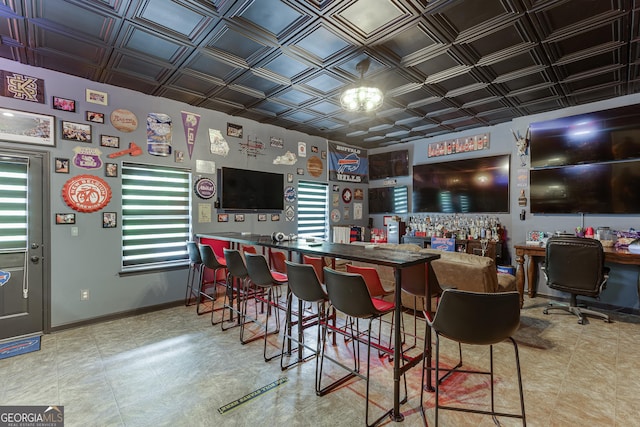 3097 Trinity Grove Dr, Dacula, GA 30019 - bar featuring baseboards, a bar, and an ornate ceiling