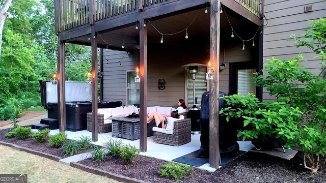 3097 Trinity Grove Dr, Dacula, GA 30019 - view of patio featuring an outdoor living space and a hot tub