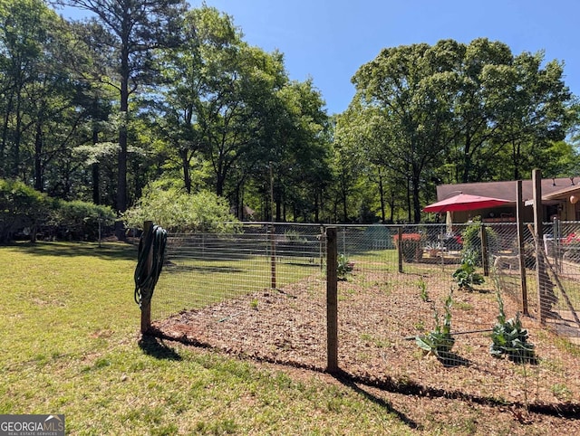 view of yard with fence
