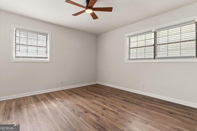 705 Oak Ln, Brunswick, GA 31523 - unfurnished room with a ceiling fan, plenty of natural light, and wood finished floors