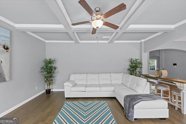 living area featuring beam ceiling, baseboards, coffered ceiling, a ceiling fan, and wood finished floors