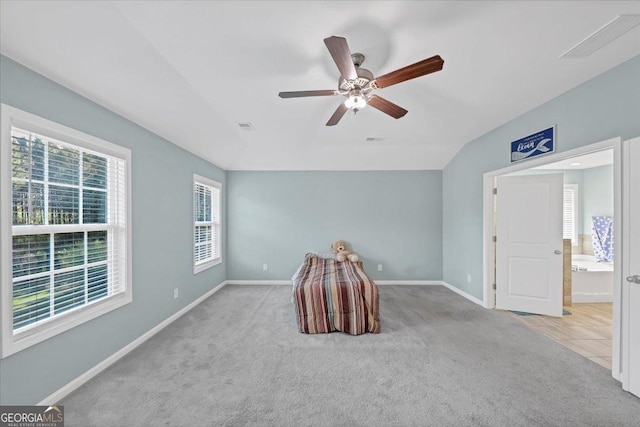 unfurnished bedroom featuring visible vents, carpet flooring, and baseboards