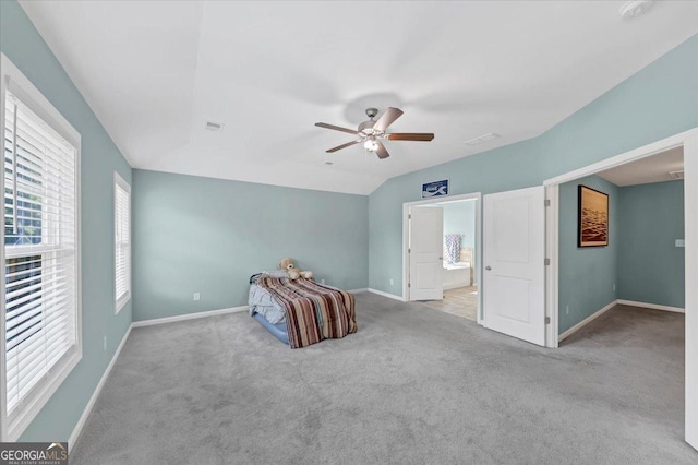 unfurnished bedroom featuring visible vents, baseboards, carpet floors, and ceiling fan
