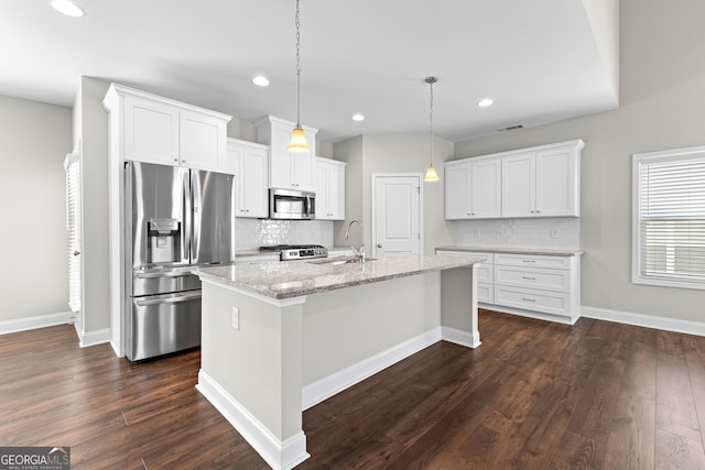 517 Lago Ct, Lagrange, GA 30241 - kitchen with dark wood finished floors, decorative backsplash, appliances with stainless steel finishes, and a sink