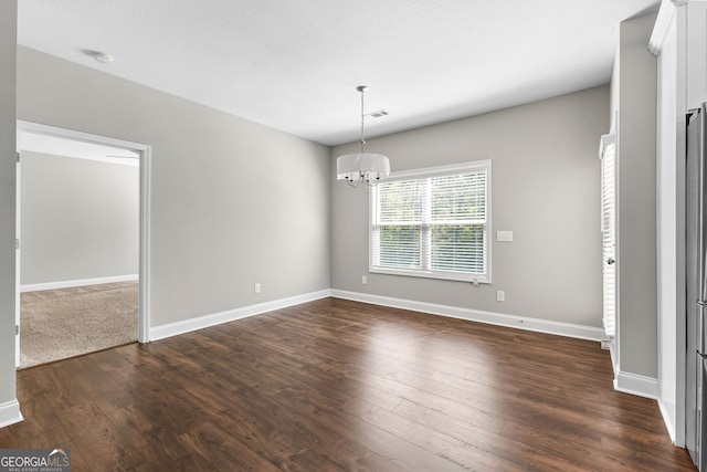 517 Lago Ct, Lagrange, GA 30241 - unfurnished dining area with visible vents, baseboards, a notable chandelier, and dark wood-style flooring