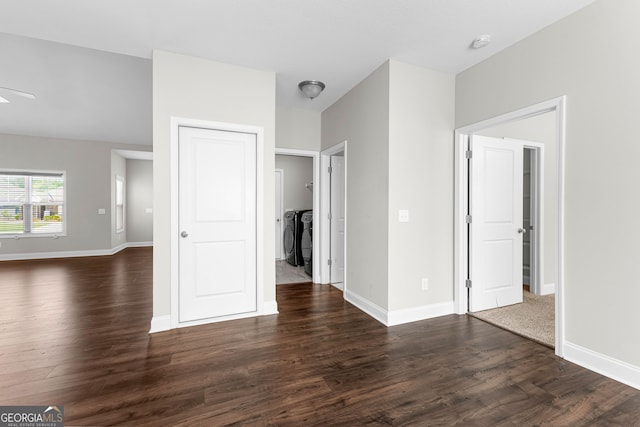 517 Lago Ct, Lagrange, GA 30241 - unfurnished bedroom featuring independent washer and dryer, baseboards, and dark wood-style flooring