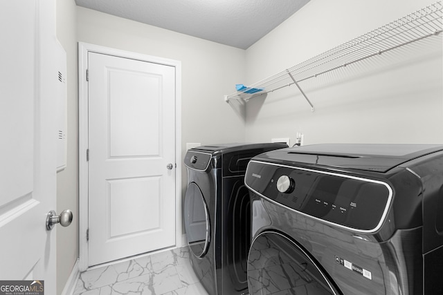 517 Lago Ct, Lagrange, GA 30241 - clothes washing area with separate washer and dryer, baseboards, marble finish floor, and laundry area