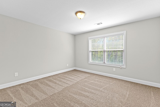 517 Lago Ct, Lagrange, GA 30241 - carpeted spare room with visible vents and baseboards