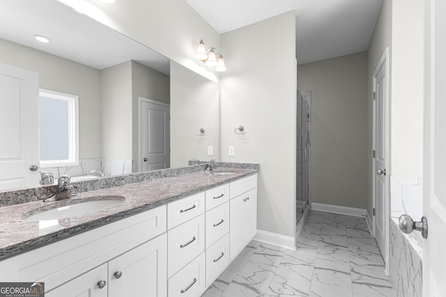 517 Lago Ct, Lagrange, GA 30241 - full bathroom featuring a shower stall, marble finish floor, a sink, and double vanity