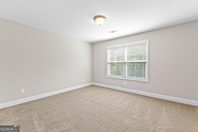 517 Lago Ct, Lagrange, GA 30241 - carpeted spare room featuring visible vents and baseboards