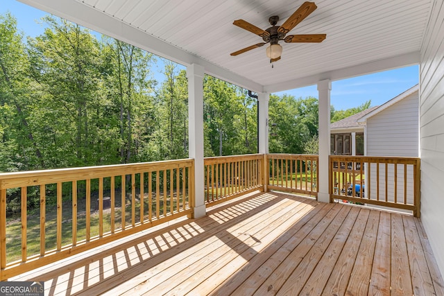 517 Lago Ct, Lagrange, GA 30241 - wooden deck with ceiling fan and a sunroom