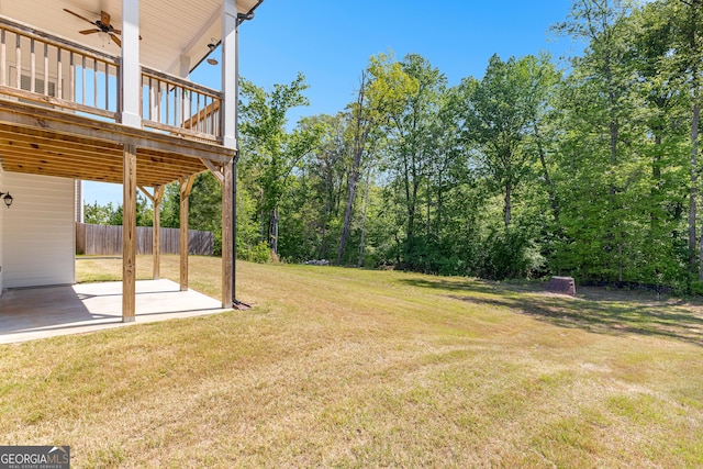 517 Lago Ct, Lagrange, GA 30241 - view of yard featuring a deck, fence, a patio area, and a ceiling fan