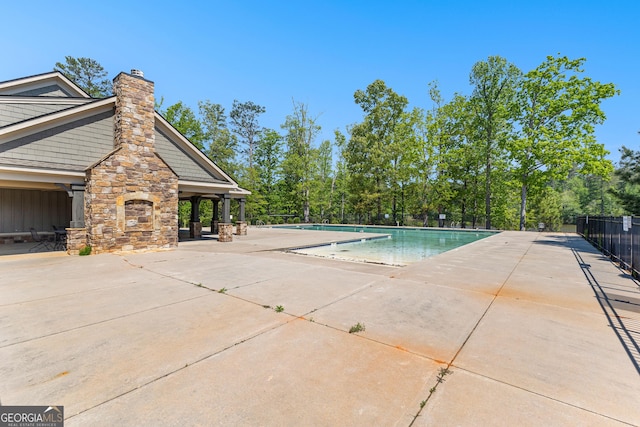 517 Lago Ct, Lagrange, GA 30241 - community pool with fence and a patio area
