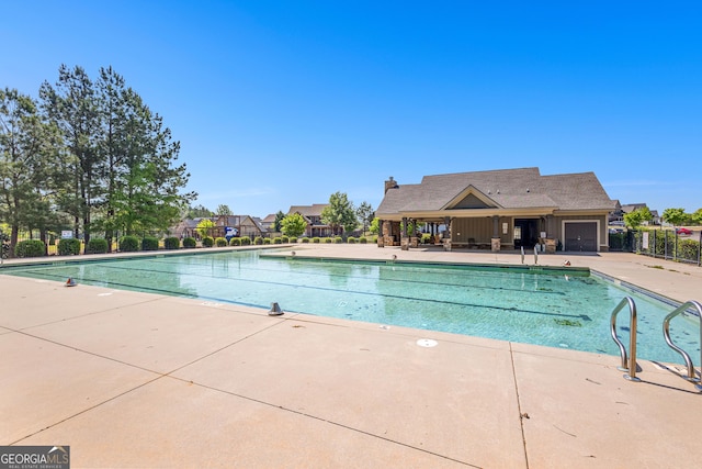 517 Lago Ct, Lagrange, GA 30241 - community pool featuring fence and a patio area